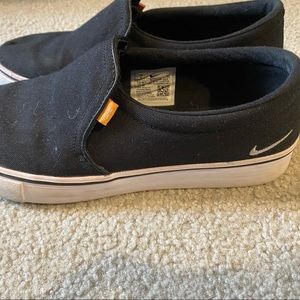 Black Nike slip ons size 9